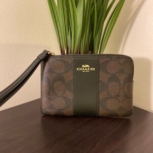 Coach wristlet black and brown